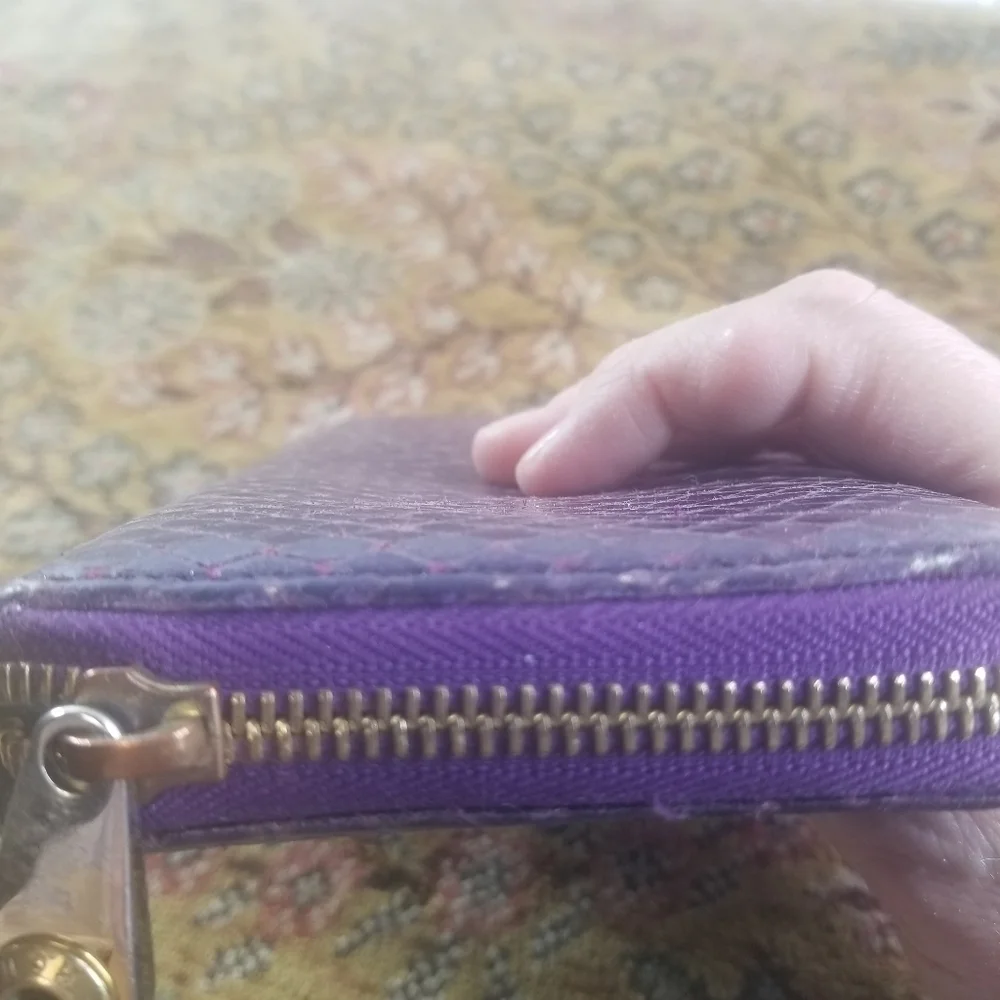Henri Bendel purple snakeskin embossed leather wallet